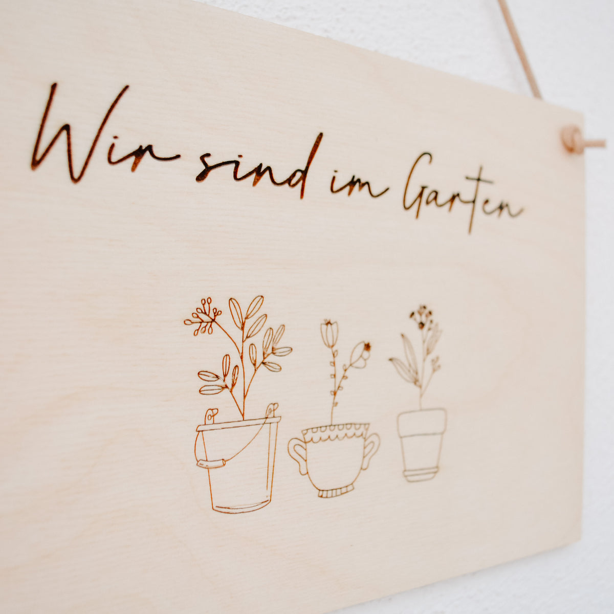 Holzschild "Wir sind im Garten"